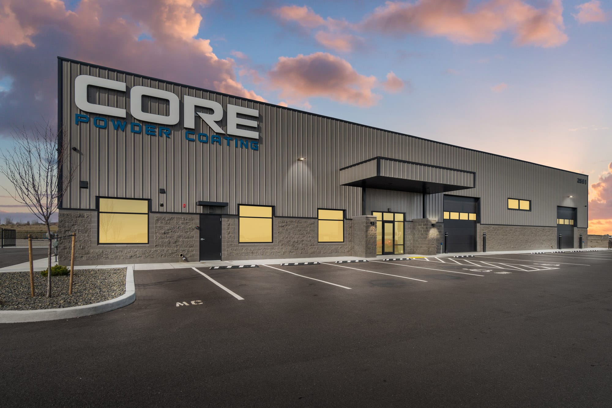 CORE Powder Coating industrial building at sunset